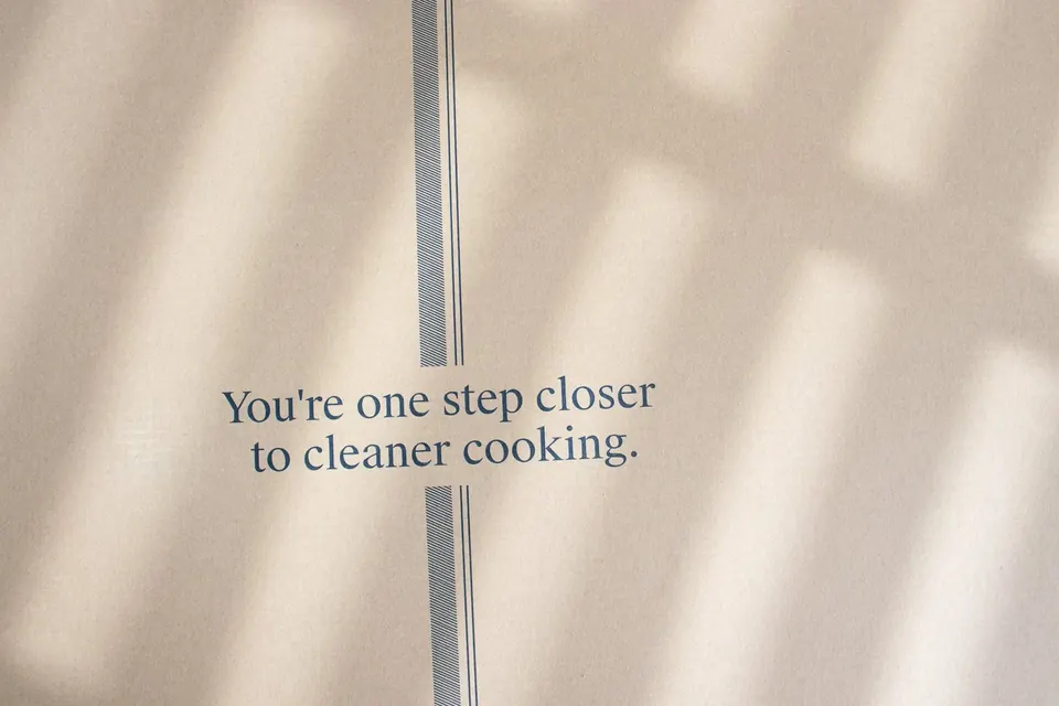 Caraway packaging with cleaner cooking slogan in soft natural light