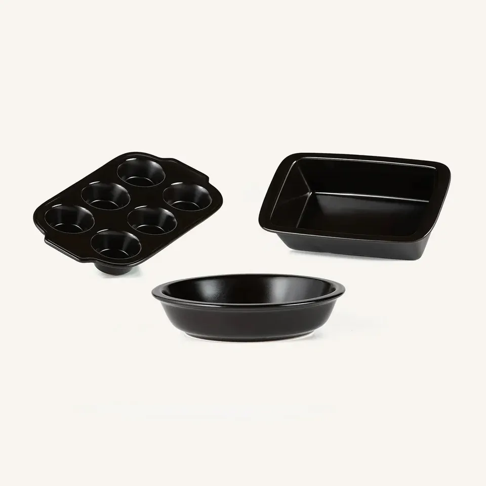 Black nonstick muffin tin, loaf pan, and pie dish