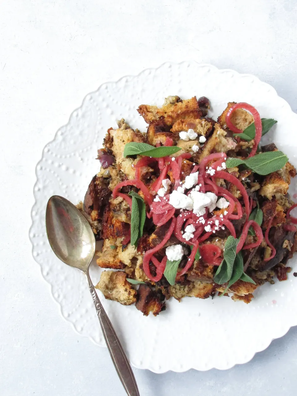Pork and sage stuffing topped with pickled onions and feta
