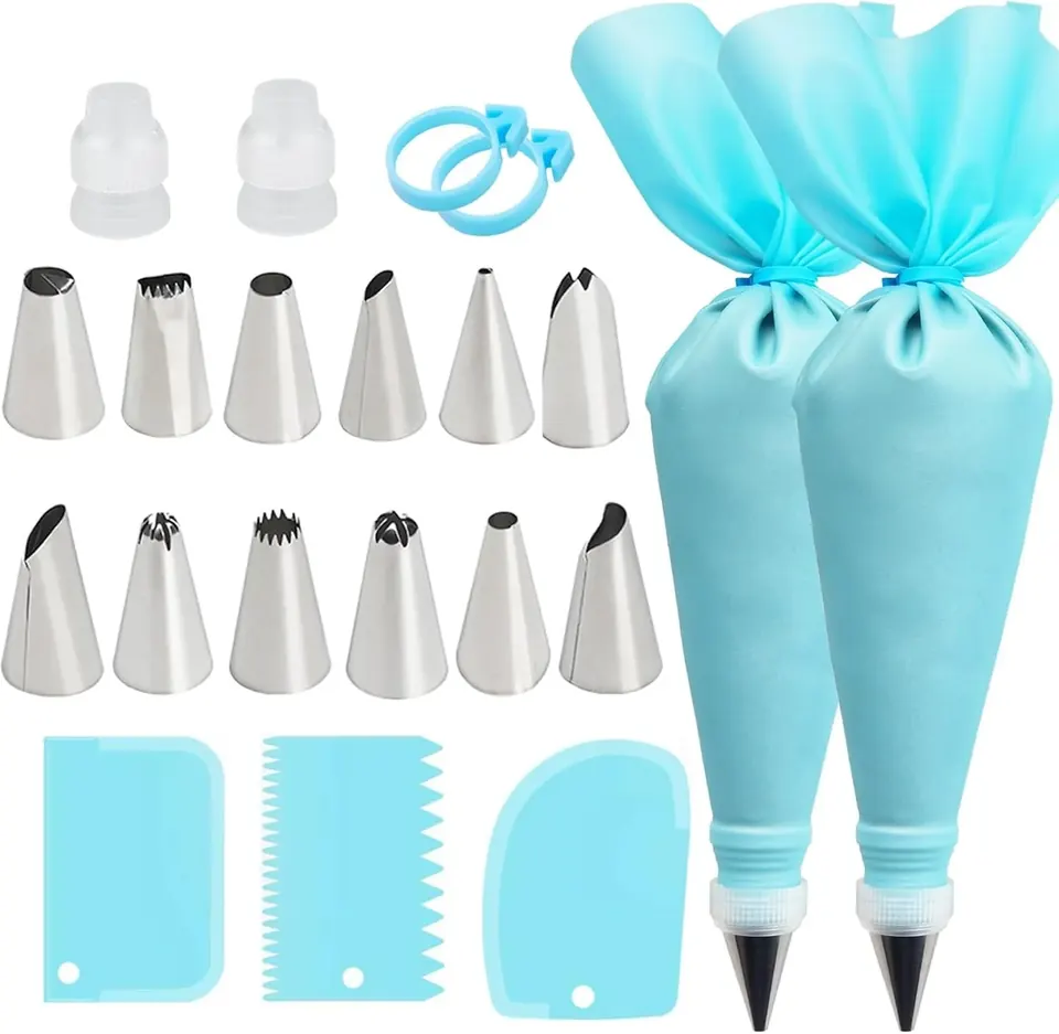 Blue piping bags with decorating tips and cake scrapers
