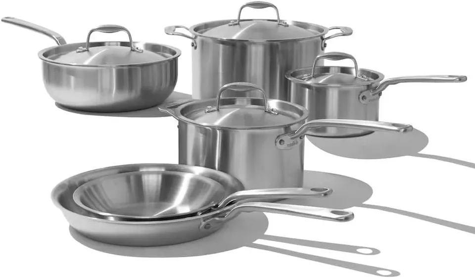 Five-piece stainless steel cookware set with pots, pans, and lids