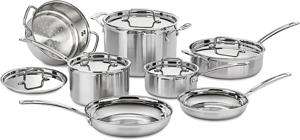 Shiny stainless steel cookware set with pots, pans, and lids