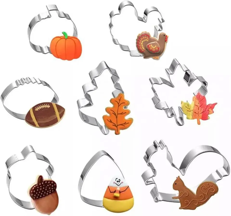 Thanksgiving cookie cutters shaped like pumpkin, turkey, leaf, and acorn
