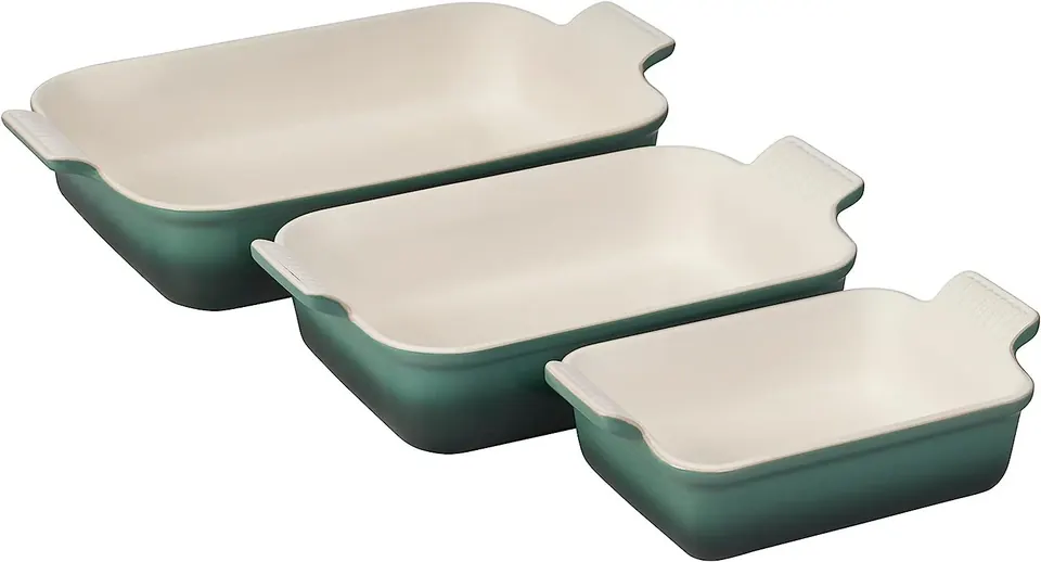 Set of three green ceramic baking dishes with handles